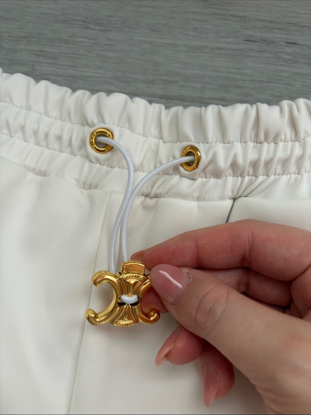 Celine White Drawstring Track Pants with Gold Logo Accent